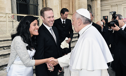 Pope Francis greets Nathalie and Matthew Dwyer at the Vatican last month while the couple was on their honeymoon. Formerly a parishioner of Transfiguration Parish, West Collingswood, (which became part of Most Precious Blood in 2012), Matthew is director of planned giving for the Diocese of Arlington, Va. Nathalie is a research associate at the Association of Land Grant Universities in Washington, D.C.