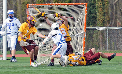 In high school boys’ lacrosse action, visiting Gloucester Catholic defeated Paul VI 8-7 in Haddon Heights, on April 15. At left, both teams fight for possession in front of Gloucester Catholic’s goal.

Photo by Alan M. Dumoff, ccdphotolibrary.smugmug.com