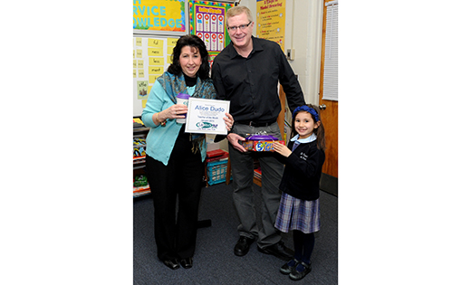 Alice Dudo, third grade teacher at St. Vincent de Paul School, Mays Landing, stands with WFPG-96.9 radio personality Eddie Davis and student Jessica Luciano, who nominated her teacher for Lite Rock Teacher of the Month earlier this year. In addition to teaching at St. Vincent de Paul, Dudo sent her six children there.

Photo by Alan M. Dumoff