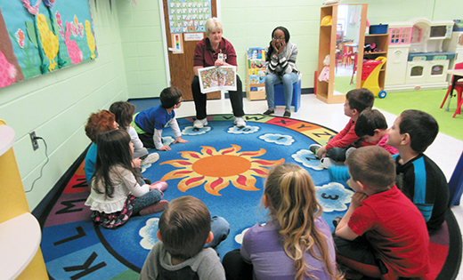 Children listen to a story at the inclusive pre-school and daycare program, Here We Grow, at St. John of God Community Services, Westville Grove. Of the 25 children in the program this year, eight have an autism spectrum disorder. Rates of autism spectrum disorder occurrence have increased every year since 2000, with New Jersey consistently reporting a rate higher than the national average. 

Photo by Joanna Gardner