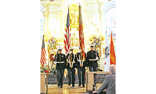 Marines bring flags to the altar of St. Joseph Church, Camden, on May 3. Sponsored by the parish History Society, the Armed Forces Day Mass and Flag Blessing honored active military personnel. The names of service men and women were read and remembered in prayer. Father Pawel W. Kryszkiewicz, parish administrator, was the celebrant.

Photo by Alan M. Dumoff, more photos ccdphotolibrary.smugmug.com