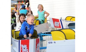 Children enjoy a ride at the carnival held at St. Margaret Regional School, Woodbury Heights, on May 20. Photo by Alan M. Dumoff