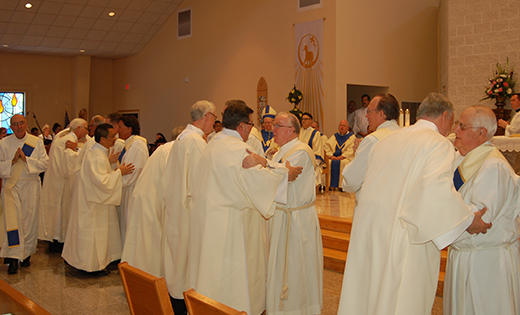 The entire diaconate congregation welcomes the newly-ordained.