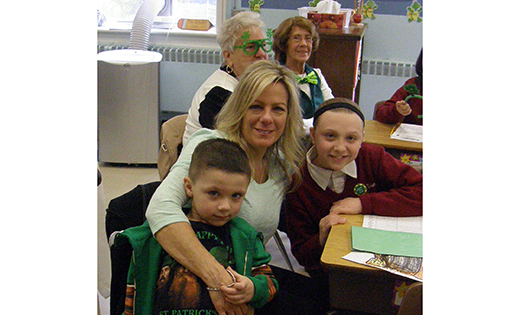 St. Teresa Regional School, Runnemede, recently honored grandparents by inviting them to spend a day at school with the grandchildren. In addition to classroom activities, there were special presentations from the students, door prizes and a grandparents’ prayer. Pictured are Julia Viscidy with her grandchildren Andrew (P-K3) and Merissa Moore, grade 5.