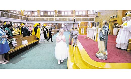Second grade students from Cape Trinity Catholic School, in their first Communion best, prepare to crown Mary during the opening Mass for the 119th annual Knights of Columbus State Convention, which took place on the morning of Friday, May 15, at Notre Dame de la Mer Parish, the Church of St. Ann, in Wildwood.  Bishop Dennis Sullivan was the main celebrant for the liturgy, which kicked off the two-day gathering of Knights from all over New Jersey.

Photo by Alan M. Dumoff, more photos http://ccdphotolibrary.smugmug.com