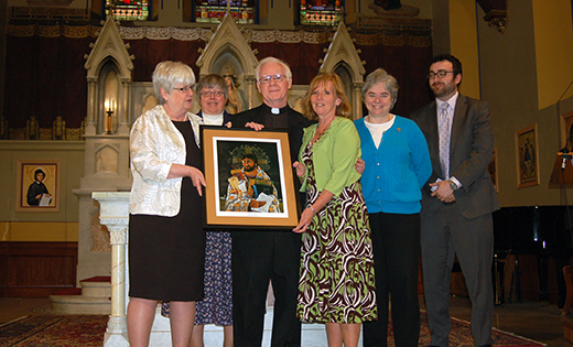 Janet Williams of Sacred Heart School, Camden, accepts the Principal of the Year Award given by Catholic Schools Office of the Diocese of Camden. Pictured, from left, are Mary Boyle, Superintendent of Schools; Sister Rose DiFluri, assistant superintendent; Msgr. Michael Doyle, pastor of Sacred Heart Parish; Williams, Sister Karen Dietrich, executive director of the Catholic Partnership Schools; and Michael Jordan Laskey, vice chancellor for the City of Camden.

Photo by James A. McBride