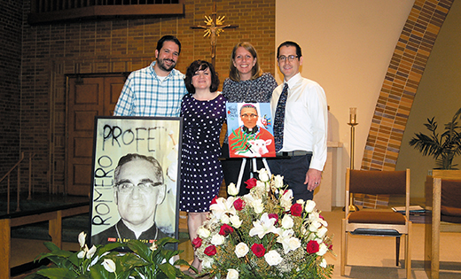 At the Sunday, June 1 English and Spanish Masses, St. Joseph-Pro Cathedral commemorated the recent beatification of Blessed Oscar Romero. With images of Blessed Romero are members of the Romero Center Ministries Staff: Jeff Petrosky (associate director), Teresa Reyes (Urban Challenge associate), Sister Julie Fertsch (Urban Challenge associate), and Patrick Cashio (executive director).

Photo by James A. McBride
