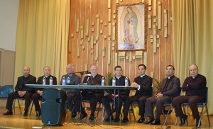 Bishop Dennis Sullivan, Atlantic City Mayor Don Guardian and priests announce the creation of the new Parish of St. Monica in Atlantic City at a June 5 press conference. Pictured from left are Father Joseph Luong T. Pham, Msgr. William A. Hodge, Mayor Guardian, Bishop Sullivan, Father Jon Thomas, Father Thanh Pham, Father Fernando Carmona and Father Jaime Hostios. Below, Msgr. Hodge stands with choir members after his last Mass as pastor of St. Nicholas of Tolentine. At the Mass, Mayor Guardian presented keys to the city to both Msgr. Hodge and to Atlantic City’s new leader, Father Thomas, symbolizing the closing of one chapter and beginning of another. Msgr. Hodge is now pastor of the historic St. Mary Parish in Gloucester City. Photo by James A. McBride