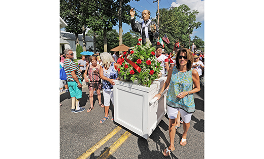 Faithful process down the Hammonton streets with a statue of St. Vincent Pallotti during the 140th annual Our Lady of Mount Carmel Festival on July 16.

Photo by Alan M. Dumoff