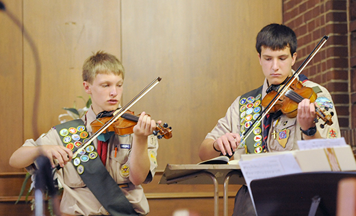 The 76th Annual Catholic Scouting Awards ceremony was held June 13 at St. John Church, Paulsboro, St. Clare of Assisi Parish. Presenting the awards were Father Paul D. Harte, chaplain and pastor of Our Lady of Sorrows Parish, Linwood; Joseph P. Brennan, general chairman; Joanne DiGennaro, chairwoman; and Gregory Coogan, director of Youth Ministry, Diocese of Camden. Music was provided by Anastasio and Nickolaos Kalfas (above), Troop 13, and St. Clare of Assisi Parish Music Ministry. The Bronze Pelican Award for Adults was presented to Patty Hughes, Troop 81, Williamstown, for her years of service. Pack 161, Our Lady of Peace Parish, Williamstown was awarded the Pope Paul VI National Catholic Quality Unit Award.

Photo by Alan M. Dumoff