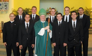 On Sunday, Aug. 9 at Christ the Redeemer Parish, Assumption Church in Atco, Bishop Dennis Sullivan accepted nine new seminarians for the Diocese of Camden who will begin studies this fall. In all, 19 seminarians for the diocese will be in formation this year, the largest number of men since 2000. The men with Bishop Sullivan, after the Mass of Acceptance, are, front row, Anthony Infanti, Steven Bertonazzi, Eric Gonnan, and Anthony McCullough; back row, John March, Stephen Robbins, Ryan Meehan, Christopher Myers, and Patrick Erdmann. Photo by James A. McBride