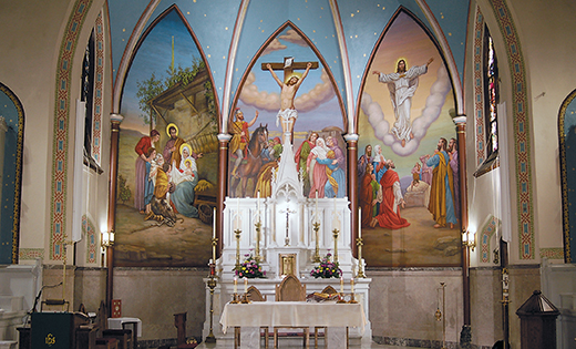 Photo by Peter G. Sánchez

The birth, death and resurrection of Jesus are depicted in the three paintings behind the altar of St. Patrick Church, Holy Angels Parish, Woodbury. Over the past 60 years the art had become cracked and caked with dirt.