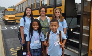St. Mary School, Williamstown principal Patricia Mancuso welcomes students. The students are (back, from left) eighth graders Gabriella Cusano and Alexis Duganitz, and (front, left) third grader Willow Massenberg and (front, right) first grader Logan Massenberg. Photo by Jackie Kern