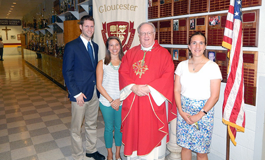 Bishop Dennis Sullivan stands with new Gloucester Catholic High School teachers Dan Satterfield and Jennifer Cush from the Alliance for Catholic Education at St. Joseph’s University, and Megan Heeder from the University of Notre Dame Echo program.