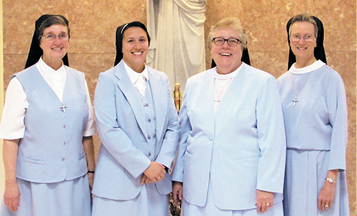 Sister Melissa Marie Mastrangelo, I.H.M., renewed the vows of chastity, poverty and obedience that she made at her first profession as a member of the Sisters, Servants of the Immaculate Heart of Mary at a Mass on Aug. 11 at Villa Maria House of Studies, the Motherhouse of the IHM Sisters in Immaculata, Pa. Sister Melissa Marie (second from left), whose parents belong to Notre Dame de le Mer Parish, Wildwood, is pictured with Sister Eileen McGuigan, IHM juniorate directress, Sister Lorraine McGrew, IHM general superior, and Sister John Evelyn DiTrolio, IHM council member.
