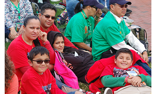 The Camarillo family from Saint Clare of Assisi Parish, Gibbstown, with mother Elena, father Raul, children Karla and Fernando (in glasses) and cousin Omar, wait for Pope Francis to speak at Philadelphia’s Independence Hall last Saturday.

Photo James A. McBride