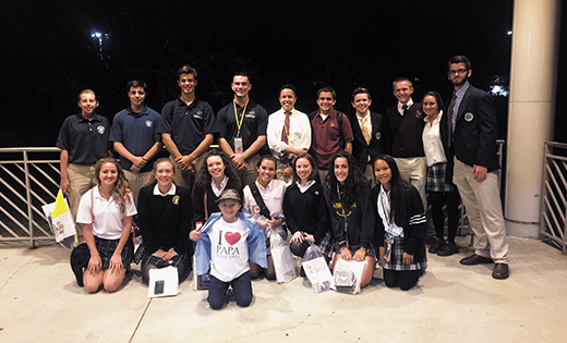 Students from Catholic schools in the Diocese of Camden pose for a photo after taking the train back from New York Sept. 25 after attending the Papal Mass in Madison Square Garden.