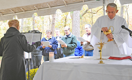Father Neal Dante, a retired priest of the Camden Diocese, was the celebrant of a Mass to celebrate All Souls Day at Saint Mary in the Pines Cemetery, Pleasant Mills, on Oct. 24.

Photo by Alan M. Dumoff
