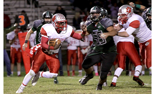Saint Joseph High School (Hammonton) quarterback Salaam Horne sweeps to the right to start out a long touchdown run, during the Wildcats’ 48-24 win against Mainland last weekend.

Photo by Mike Walsh