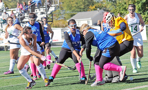 On Oct. 17, Camden Catholic (Cherry Hill) beat visiting Paul VI (Haddon Township) by a score of 1-0 in high school field hockey. At left, a fierce contest for possession.

Photo by Alan M. Dumoff
