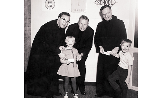 Brother Damien O’Shea, left, was one of the first five members of the Hospitaller Order of St. John of God who founded St. John of God Community Services. He is pictured with Father — later Msgr. James — Gaffney, Brother Leo Clancy and children. The agency is celebrating its 50th anniversary with a gala on Friday, Nov. 6, at Auletto Caterers in Deptford Township.