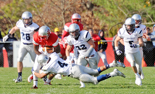 The football team of Saint Joseph High School (Hammonton) defeated Immaculata, 48-6, in the State Non-Public II semifinal game on Nov. 21. The win sets up the seventh straight state title game for the Wildcats. They will play Hudson Catholic on Dec. 6 at Rowan University. Top photo, a Spartan tries to bring down a Wildcat. Bottom photo, a watchful referee amidst gridiron action.

Photos by Alan M. Dumoff