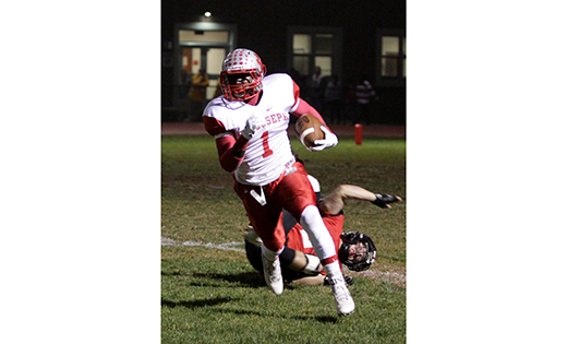 Saint Joseph High School (Hammonton) quarterback Salaam Horne runs with the ball during the Wildcats’ away game at Ocean City on Nov. 6, with Paul Sacco’s team handily defeating the home team 35-0.

Photo by Mike Walsh