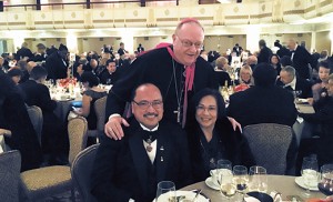 The bishop with Roger and Josephina Tizon.
