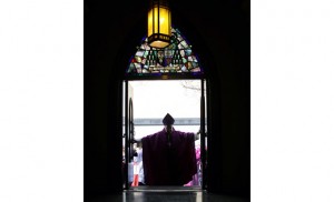 Bishop Dennis Sullivan opens the Holy Door of the Cathedral of the Immaculate Conception, Camden, on Dec. 13, as part of the Jubilee Year of Mercy. Photo by Mike Walsh