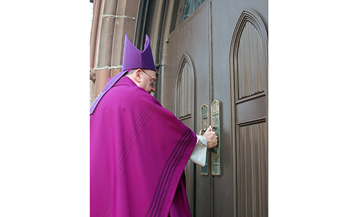 Bishop Dennis Sullivan opens the Holy Door of the Cathedral of the Immaculate Conception, Camden, on Dec. 8.

Photo by James A. McBride