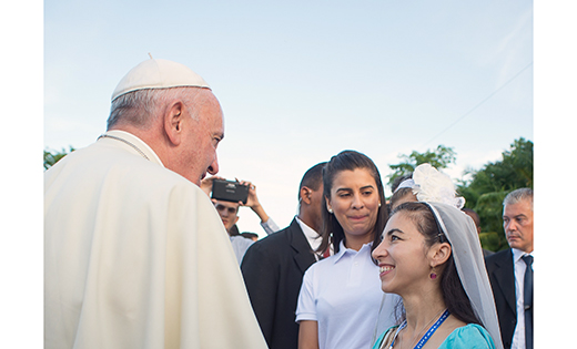 Pope Francis greets Dr. Christina Hip-Flores in Cuba during his visit there in September. Hip-Flores, who works part time in the Camden Diocese Tribunal, was part of Cuba’s organizing committee for the papal visit.

Photo L’Osservatore Romano