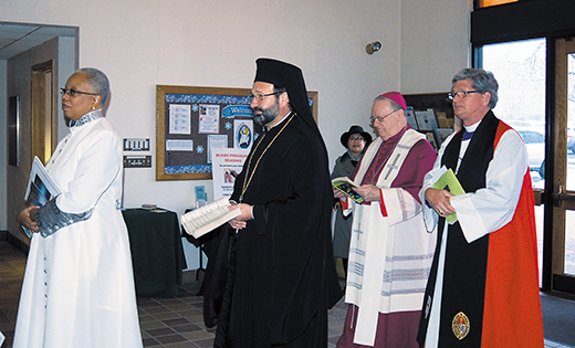 Bishop Dennis Sullivan, with other Christian bishops, judicatory heads, and other area Christian clergy and faithful, celebrated a service on the afternoon of Sunday, Jan. 17, at St. Mary Church in Cherry Hill, to kick off the Week of Prayer for Christian Unity. Following the Mass, Bishop Sullivan and clergy joined a group of homeless men for a meal at the parish.

Photo by James A. McBride