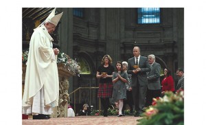 Pope Francis waits to accept the offertory gifts from Catholics of the Diocese of Camden during Mass marking the feast of the Solemnity of Mary, Mother of God, in St. Peter's Basilica at the Vatican on Jan. 1. Pictured are Linda, Ed and Catherine McCarron of Haddonfield; Helen and Jim Checchio of Collingswood; and Dave and Christina McCarron of Oaklyn. Not pictured, Danielle Kehoe of Collingswood. Photo courtesy of Msgr. James F. Checchio