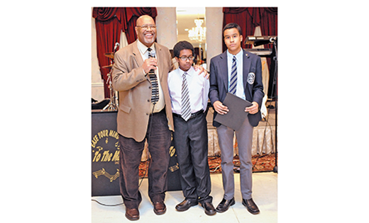 Ricardo Taylor, scholarship chairperson, congratulates Stephen Malloy and Myles Holder, winners of the annual Black Catholic Ministry Commission scholarships. The presentation was made during the commission’s annual Afternoon of Jazz, Plus on Feb. 14 at Masso’s Crystal Manor, Glassboro.

Photo by Alan M. Dumoff