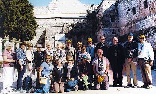 Father Robert Hughes, vicar general of the Diocese of Camden, third from right, and pilgrims from the Diocese of Camden pose for a photo in Bethlehem
during a recent pilgrimage to the Holy Land.

Photo by Nadir Abu-Dayyeh