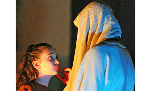 Jesus, portrayed by Gabriel Arasim, comforts the daughter of Jairus (Gianna Delcampo) during a presentation of “Jesus the Healer: A Living Meditation on Healing” by the Franciscan Mystery Players at Our Lady of Perpetual Help Parish, Saint Nicholas Church, Egg Harbor, on March 4. The plays employ lighting, music, drama and reflections on suffering and healing. Sponsored by Our Lady of Hope Parish in Blackwood, and dedicated to the Year of Mercy, the Franciscan Mystery Players have presentations scheduled at Holy Child Parish, Runnemede, on Friday, March 11, 7 p.m.; Saint Stephen Parish, Pennsauken, on Friday, March 18, 7:30 p.m.; and Our Lady of Hope, Blackwood, on Saturday, March 19, 7:30 p.m.

Photo by Alan M. Dumoff
