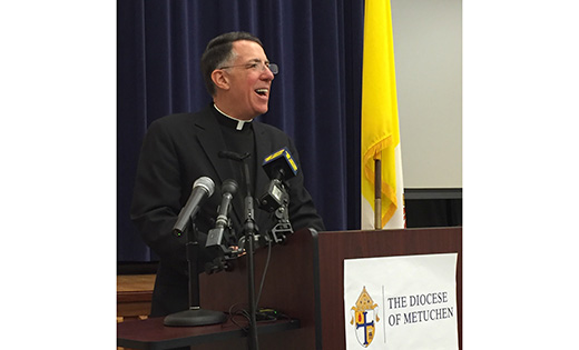 Msgr. James F. Checchio, a priest of the Camden Diocese, speaks at a press conference March 8 announcing his appointment as bishop of the Diocese of Metuchen. Bishop-designate Checchio grew up in Collingswood and served in South Jersey before spending a decade in Rome as rector of the Pontifical North American College. In Metuchen he replaces Bishop Paul G. Bootkoski, who is retiring at the age of 75.

Photo Diocese of Metuchen