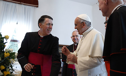 Pope Francis talks with Bishop-designate James F. Checchio in May when he was rector of the Pontifical North American College. It was the first papal visit to the U.S. seminary since 1980. 
 (CNS photo/Paul Haring)