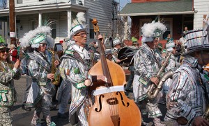 The first-ever Saint Patrick’s Day Parade in Gloucester City, held March 6, had revelers seeing nothing but green as the Knights of Columbus, two Mummers’ string bands, the Gloucester City Irish Society and school groups marched on Monmouth Street, beginning at King and Monmouth and ending at Johnson Boulevard. Bishop Dennis Sullivan served as Grand Marshal for the day’s festivities. Below, the Durning String Band marches on; a jubilant child waves to the crowd along the parade route. Photos by James A. McBride