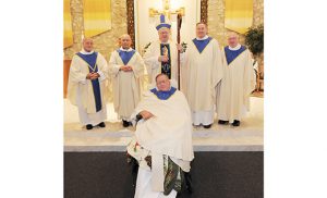 Bishop Sullivan stands with the priests celebrating 50 years. From left, Msgr. Victor Muro, Father Anthony Patrizio, Father William Bleiler and Father Daniel DiNardo. In front is Msgr. Thomas McIntyre. Not pictured: Father Robert Gomes.