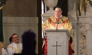 Father Kennedy preaches during his first Mass on May 22. Photo by Michael Walsh