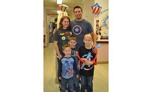 Aidan’s parents Christine and Glenn Eberhardt and their children, from left, Owen, Connor and Aidan.