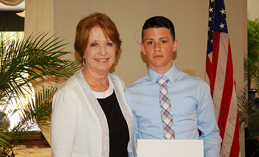 Below, Katharine Coghlan, Dr. Coghlan’s wife, stands with Ethan Guldin, the third scholarship winner. Ethan is an eighth grade graduate of Gloucester Catholic Junior High and received a $1,000 scholarship to Gloucester Catholic Senior High School.