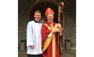 Bishop Dennis Sullivan stands with Camden seminarian Henry Laigaie at Saint Joseph Seminary in New York on Sept. 20. The bishop celebrated the Rite of Candidacy for the men in first theology there and Laigaie was formally accepted as a candidate for Holy Orders at the Mass