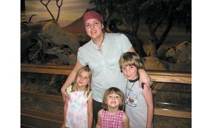 Sarah Steele is pictured with her children Sophie, Evelyn and Clayton while she was being treated for anaplastic astrocytoma, a rare, aggressive stage 3 brain cancer.