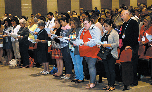 Catechists pray at the Diocesan Religious Education Convocation at Paul VI High School, Haddon Township, on Sept. 17.

Photo by James A. McBride