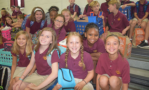 Members of the fifth grade class at Christ the King Regional School in Haddonfield, smile for the camera on the first day back to school, Tuesday, Sept. 6.

Photo by Cynthia Soper
