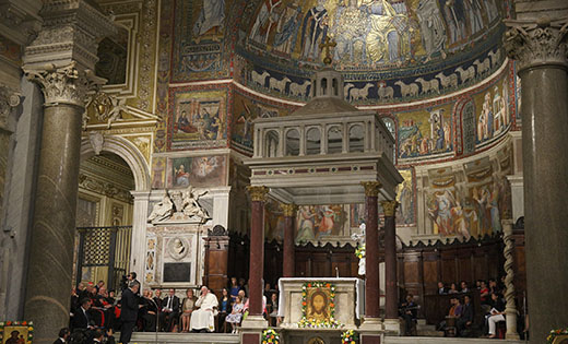 Pope Francis listens as Andrea Riccardi, founder of the Community of Sant’Egidio, speaks during a visit to the Basilica of Santa Maria in Rome’s Trastevere neighborhood in this 2014 file photo. The pope visited members of the Community of Sant’Egidio, which has its headquarters near the basilica.

CNS photo/Paul Haring