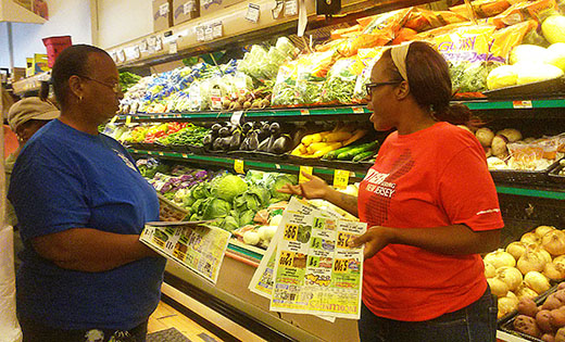 Workshop attendees compare unit prices and retail prices at Incollingo’s Market in Penns Grove. The “Cooking Matters at the Store” Program, funded in part through a Catholic Charities grant, educates individuals on how to get the most nutrition and how to stretch their food dollars.