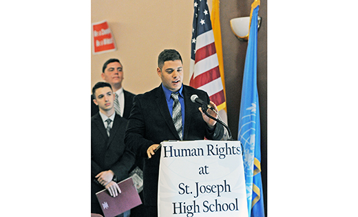 Students from several local schools converged at Saint Joseph High School, Hammonton, on Oct. 21 for United Nations Day 2016. Students developed pledges of action on the issues of self image, air quality, and domestic abuse. The conference topic was universal happiness. Above, Saint Joseph student Jack Peacock at the podium, addressing Demetrios Argyriades, special envoy of the United Nations, who addressed the students via satellite.

Photo by Alan M. Dumoff